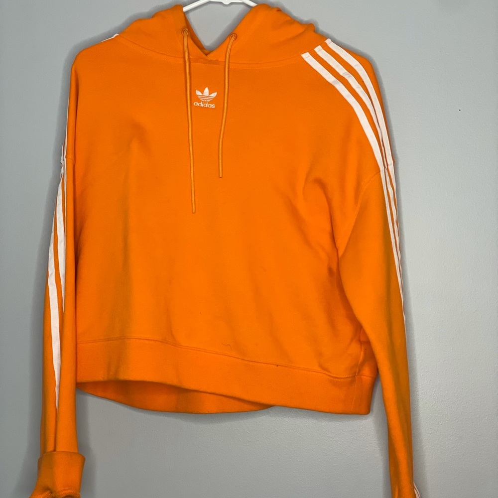 Orange Adidas semi cropped hoodie.